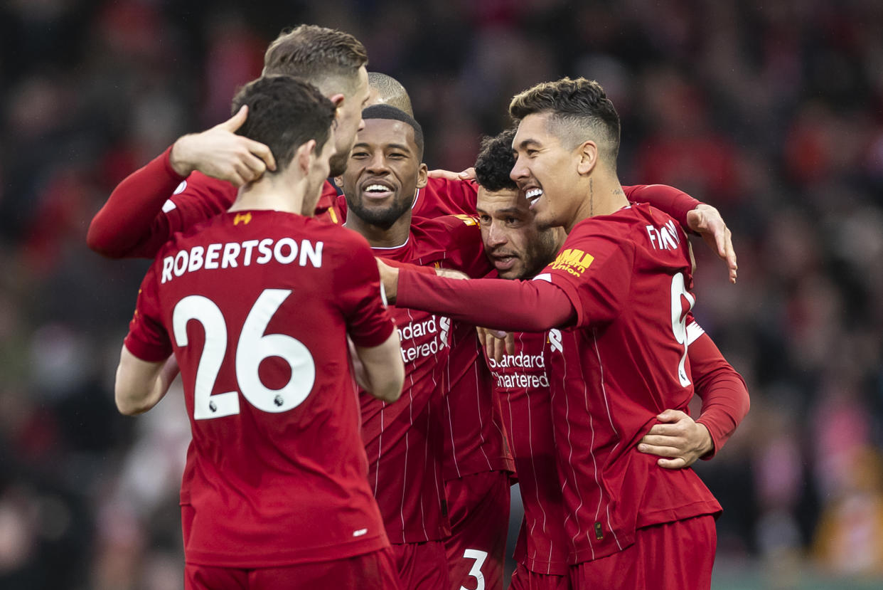 LIVERPOOL, ENGLAND - FEBRUARY 01: Alex Oxlade-Chamberlain of Liverpool celebrates with teammates after scoring their first goal to make the score 1-0 during the Premier League match between Liverpool FC and Southampton FC at Anfield on February 1, 2020 in Liverpool, United Kingdom. (Photo by Daniel Chesterton/Offside/Offside via Getty Images)