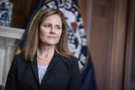 Judge Amy Coney Barrett, President Donald Trumps nominee for the U.S. Supreme Court, meets with Sen. Shelley Moore Capito, R-W.Va., not shown, on Capitol Hill in Washington, Wednesday, Sept. 30, . (Sarah Silbiger/Pool via AP)