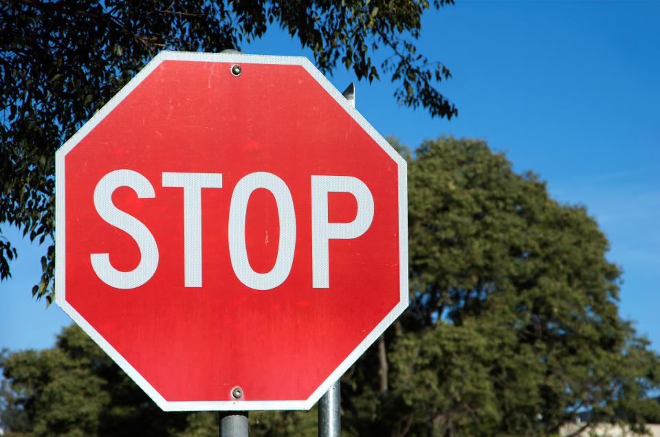 A stop sign is pictured.