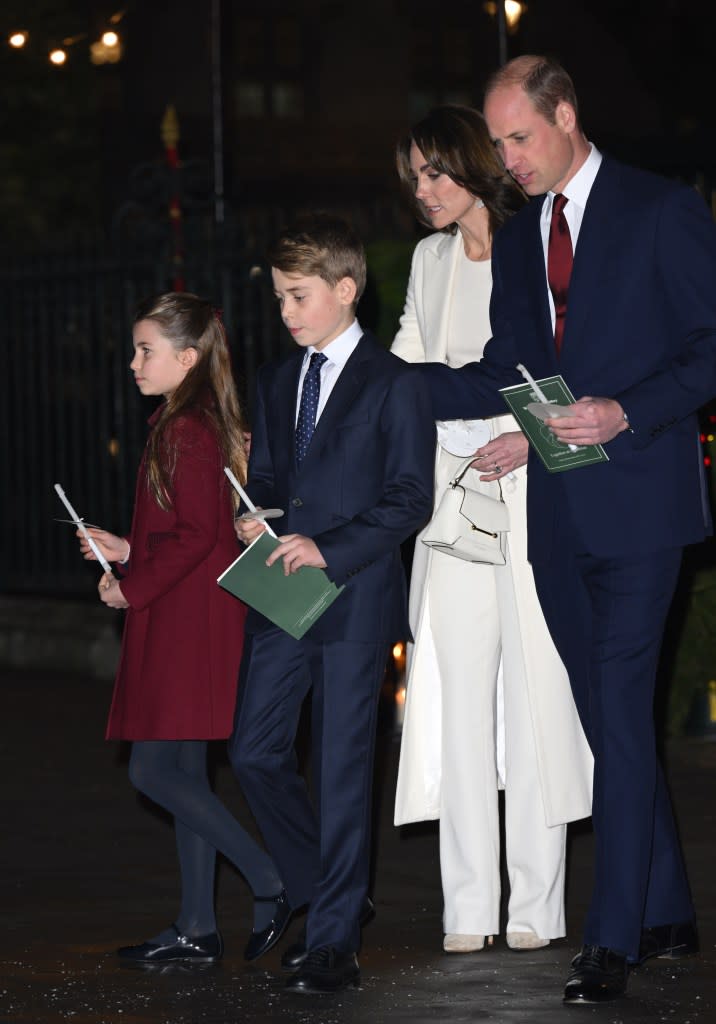 Princess Charlotte, Prince George, Princess Kate and Prince William attend the “Together at Christmas” carol service at Westminster Abbey on Dec. 8, 2023, in London. WireImage