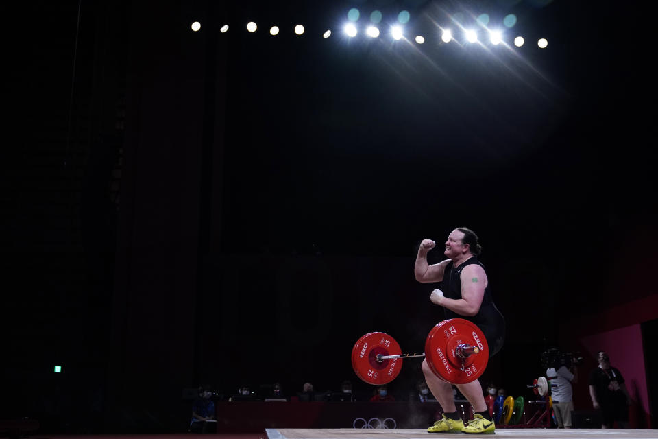 FILE - In this Aug. 2, 2021, file photo, Laurel Hubbard of New Zealand celebrates after a lift in the women's +87kg weightlifting event at the 2020 Summer Olympics, in Tokyo, Japan. (AP Photo/Seth Wenig, File)