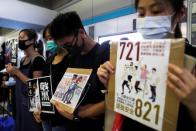 Protest at Yuen Long MTR station, the scene of an attack by suspected triad gang members a month ago