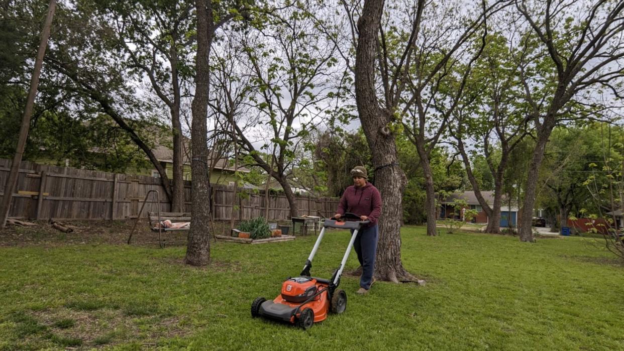  Alex testing the Husqvarna Lawn Xpert LE-322 in her own backyard 