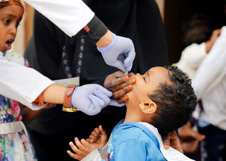 A boy receives a cholera vaccination during a house-to-house immunization campaign in Sanaa, Yemen April 24, 2019. REUTERS/Khaled Abdullah