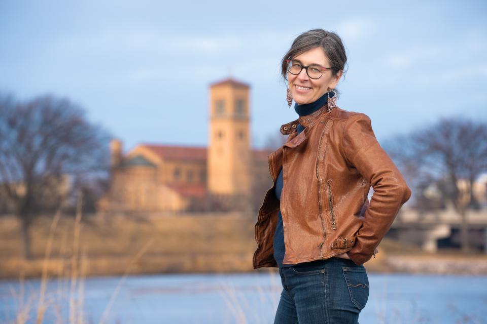 Anne Buckvold poses for a photo at Lake George looking towards Downtown St. Cloud on February 6, 2024.