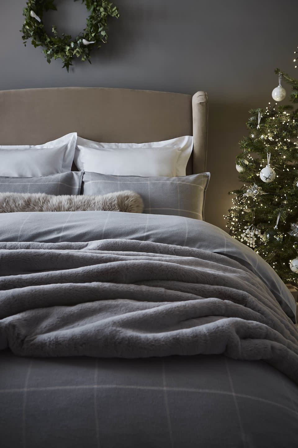 <p>Short days and long nights mean more time at home, which is a great opportunity to ramp up the cosy volume in your bedroom. As part of Dunelm's Christmas range, you'll find fluffy throws, festive bedding and cushions to curl up with. </p><p><strong>READ MORE</strong>: <a href="https://www.housebeautiful.com/uk/lifestyle/g23481079/christmas-bedding/" rel="nofollow noopener" target="_blank" data-ylk="slk:26 Christmas bedding sets every bedroom needs this festive season;elm:context_link;itc:0;sec:content-canvas" class="link ">26 Christmas bedding sets every bedroom needs this festive season</a></p>