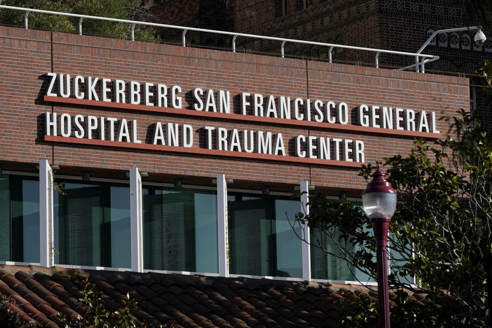 A Zuckerberg San Francisco General Hospital and Trauma Center sign is shown in San Francisco, Monday, Dec. 14, 2020. Supervisors in San Francisco will vote on a nonbinding and symbolic resolution to condemn the naming of the city's public general hospital for Facebook CEO Mark Zuckerberg in 2015 after he and his wife, Dr. Priscilla Chan, donated $75 million for a new trauma center. Supporters of a condemnation say the Facebook co-founder and CEO has endangered public health and threatened democracy with a platform that spreads misinformation and invaded people's privacy. (AP Photo/Jeff Chiu)