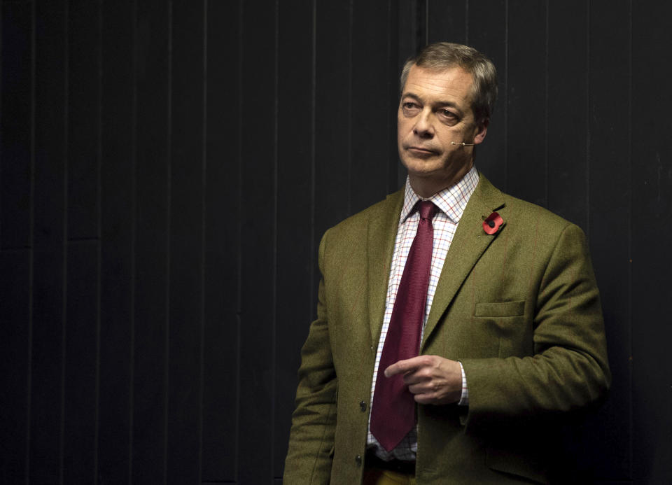 Brexit Party leader Nigel Farage during a public rally at a miner's social club in Nottingham, England, Tuesday Nov. 5, 2019. Britain's Brexit split with Europe is one of the main issues as the country goes to the polls in a General Election on Dec. 12. (Joe Giddens/PA via AP)