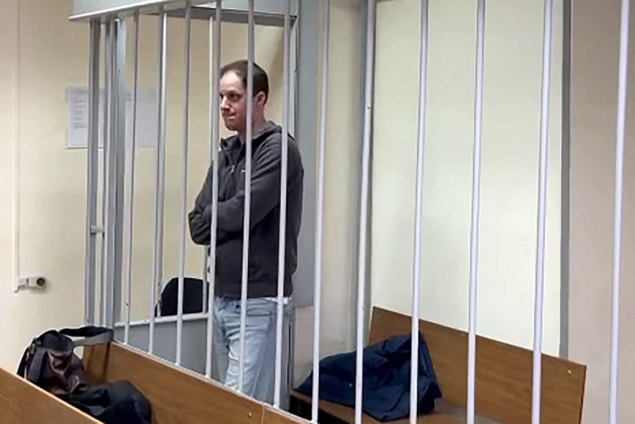This grab from a handout footage provided by the Lefortovsky Court on Jan. 26, 2024 shows US journalist Evan Gershkovich, arrested on espionage charges, standing inside a defendants' cage during a hearing on the extension of his pre-trial detention, in Moscow. A Moscow court on Jan. 26, 2024 extended until March 30 the detention of Evan Gershkovich, an American Wall Street Journal reporter held in Moscow on espionage charges which he denies.