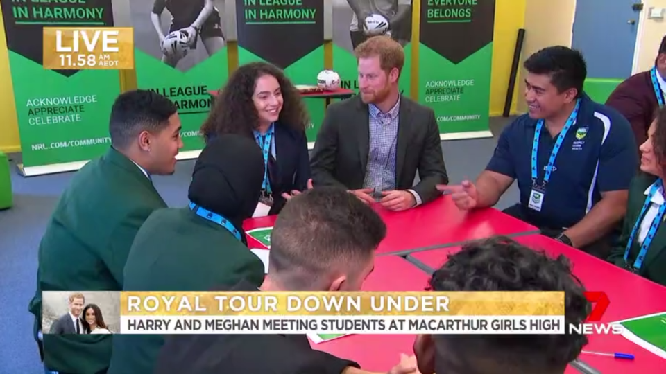 Prince Harry sits in on a workshop with students. Photo: Channel 7