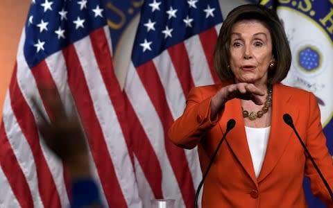 Nancy Pelosi, the Democratic House Speaker, announced the launch of an impeachment inquiry into Donald Trump in September - Credit: AP Photo/Susan Walsh