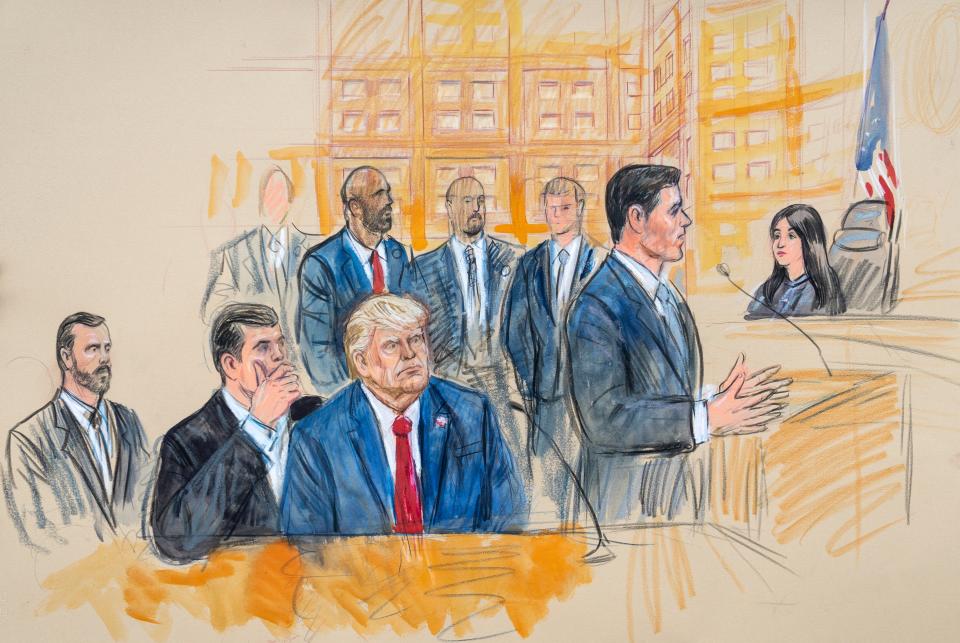 This artist sketch depicts former President Donald Trump, center, conferring with defense lawyer Todd Blanche, left, during his appearance at the Federal Courthouse in Washington on Thursday as Trump defense lawyer John Lauro faces U.S. Magistrate Judge Moxila Upadhyaya. Special Prosecutor Jack Smith sits at far left. Trump pleaded not guilty in federal court to charges that he conspired to overturn the 2020 election.