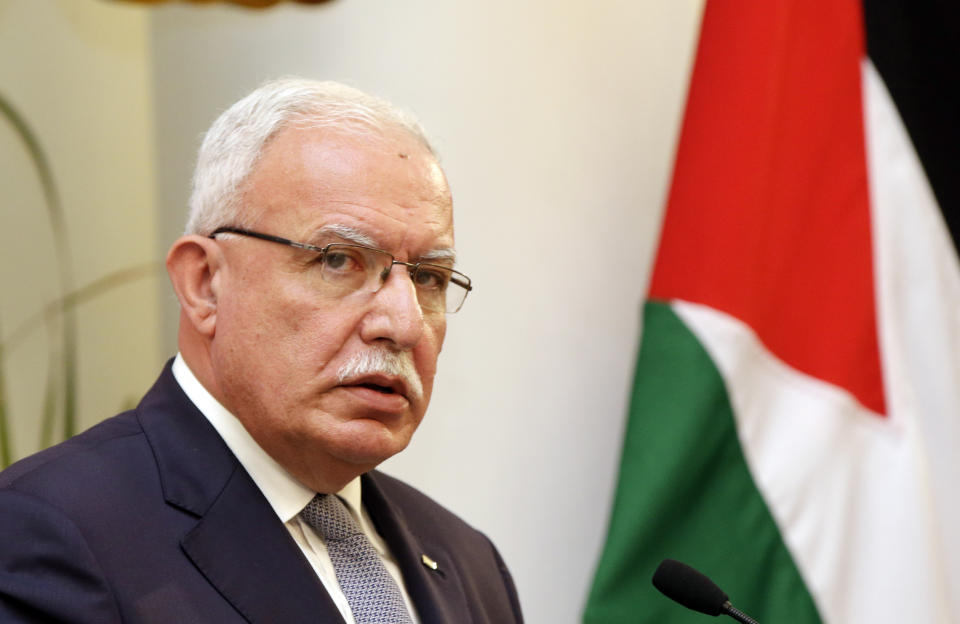 Palestinian Foreign Minister Riyad al-Maliki talks to journalist during a joint press conference with Indonesian Foreign Minister Retno Marsudi in Jakarta, Indonesia, Tuesday, Oct. 16, 2018. (AP Photo/Achmad Ibrahim)