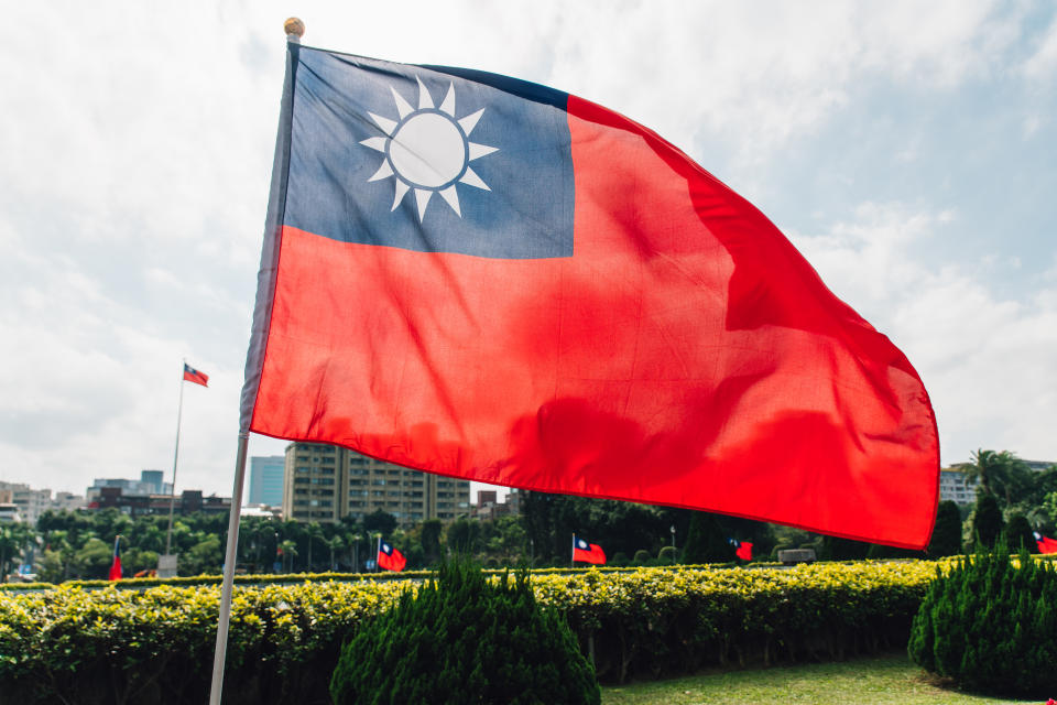 Taiwan national flag waving in the wind near the area of National Dr. Sun Yat-Sen Memorial Hall in Taipei, Taiwan.