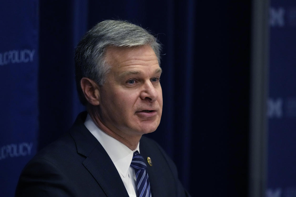 FBI Director Christopher Wray speaks at the Gerald R. Ford School of Public Policy at the University of Michigan, Friday, Dec. 2, 2022, in Ann Arbor, Mich. Wray is raising national security concerns about TikTok, warning Friday that control of the popular video sharing app is in the hands of a Chinese government "that doesn't share our values." (AP Photo/Carlos Osorio)