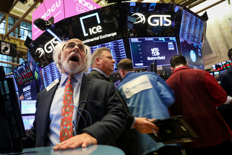 Traders work on the floor of the New York Stock Exchange (NYSE) in New York, U.S., December 6, 2018. REUTERS/Brendan McDermid