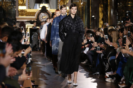 Models present creations by British designer Stella McCartney as part of her Fall/Winter 2016/2017 women's ready-to-wear collection show in Paris, France, March 7, 2016. REUTERS/Benoit Tessier