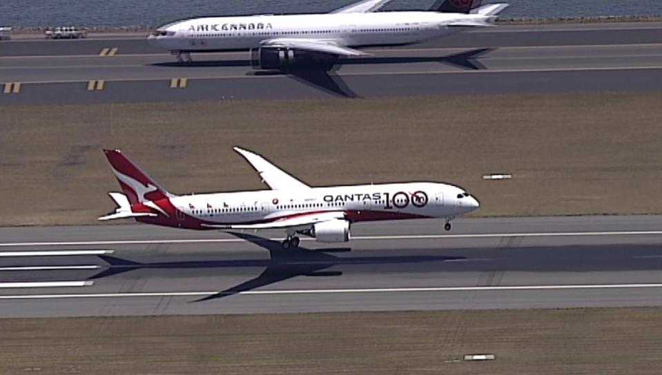 In this image made from video, Qantas Boeing 787 Dreamliner plane lands at Sydney airport in Sydney, Friday, Nov. 15, 2019. Australian airliner Qantas completed a non-stop flight from London to Sydney used to assess the effects of ultra-long-haul flights on crew fatigue and passenger jetlag.(Australia Pool via AP)