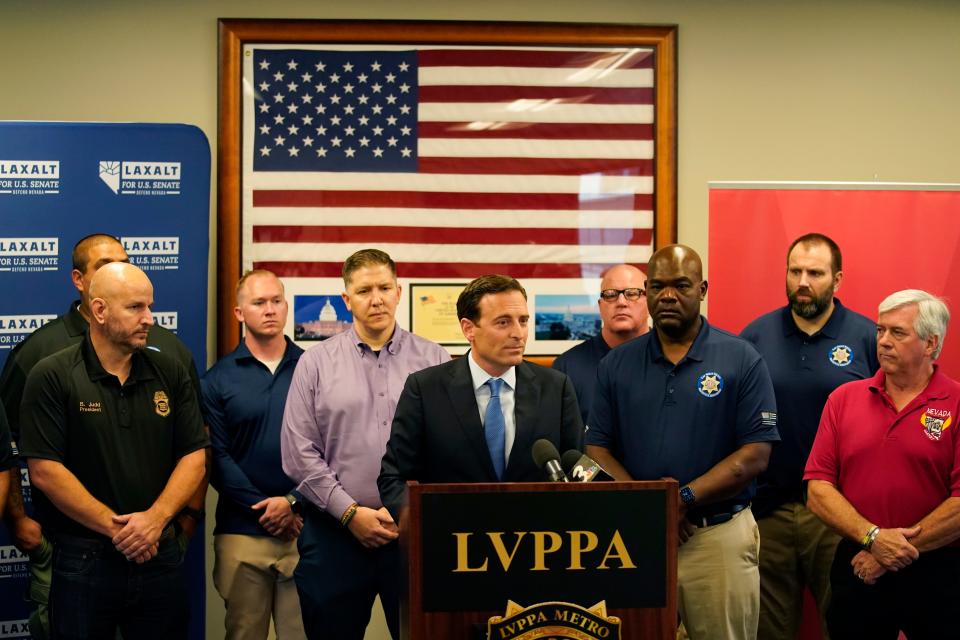 Republican Nevada Senate candidate Adam Laxalt speaks at a news conference, Thursday, Aug. 4, 2022, in Las Vegas. Officials from several law enforcement unions, including the Las Vegas Police Protective Association and the National Border Patrol Counsel, spoke in support of Laxalt's candidacy.