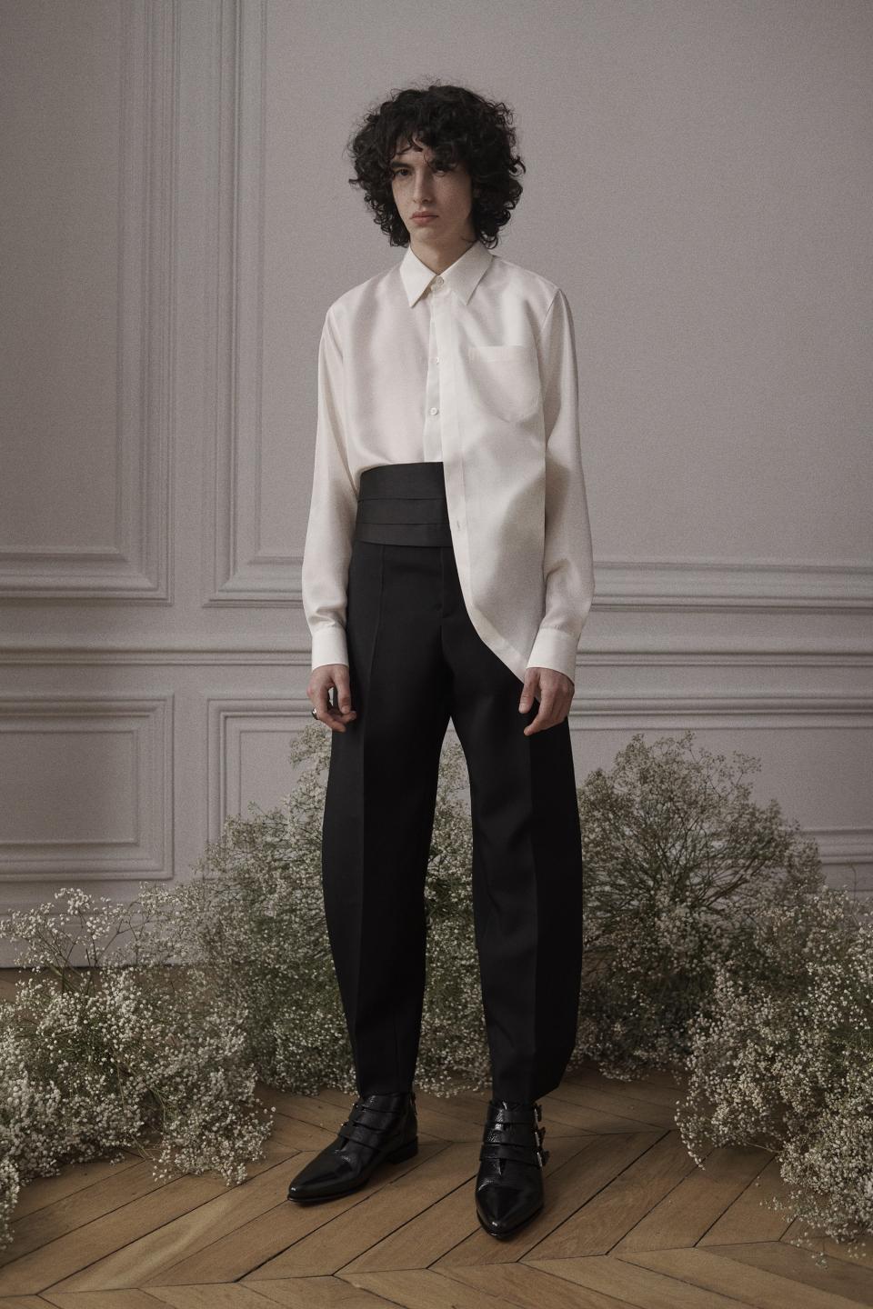 At Clare Waight Keller’s Givenchy menswear debut, expect ’70s-seen-through-the-’90s silhouettes and a new dandified elegance.