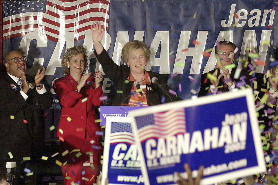 FILE - Sen. Jean Carnahan, D-Mo., center, waves to supporters Sunday, April 28, 2002, during a campaign rally in Maplewood, Mo., where she announced her plans to seek election to the U.S. Senate. Carnahan, who became the first female senator to represent Missouri after she was appointed to replace her husband following his death, died Tuesday, Jan. 30, 2024. She was 90. (AP Photo/James A. Finley, File)