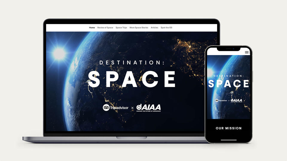  Photo of a laptop screen and smartphone screen, both of which read "destination: space" with earth in the background. 