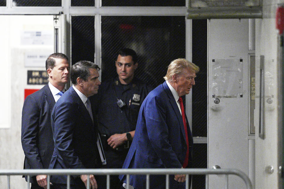 Former President Donald Trump, with attorney Todd Blanche, left, enter the courtroom at Manhattan criminal court in New York, Friday, Friday, May 10, 2024. (Curtis Means/DailyMail.com via AP, Pool)