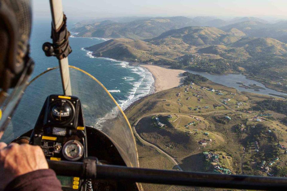 <p>Mark Ziembicki/Courtesy of andBeyond</p> Microlight aircraft patrol the coast to report wildlife sightings.