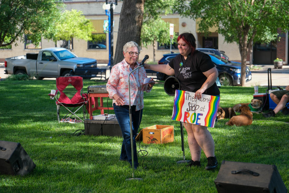 Jewel Taylor welcomes Claudia Stravato to speak at a rally protesting the repeal of Roe V. Wade on its two year anniversary Monday afternoon at the Potter County Courthouse in Amarillo.