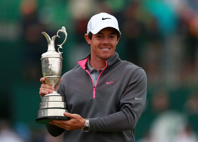 Rory McIlroy holds the Claret Jug