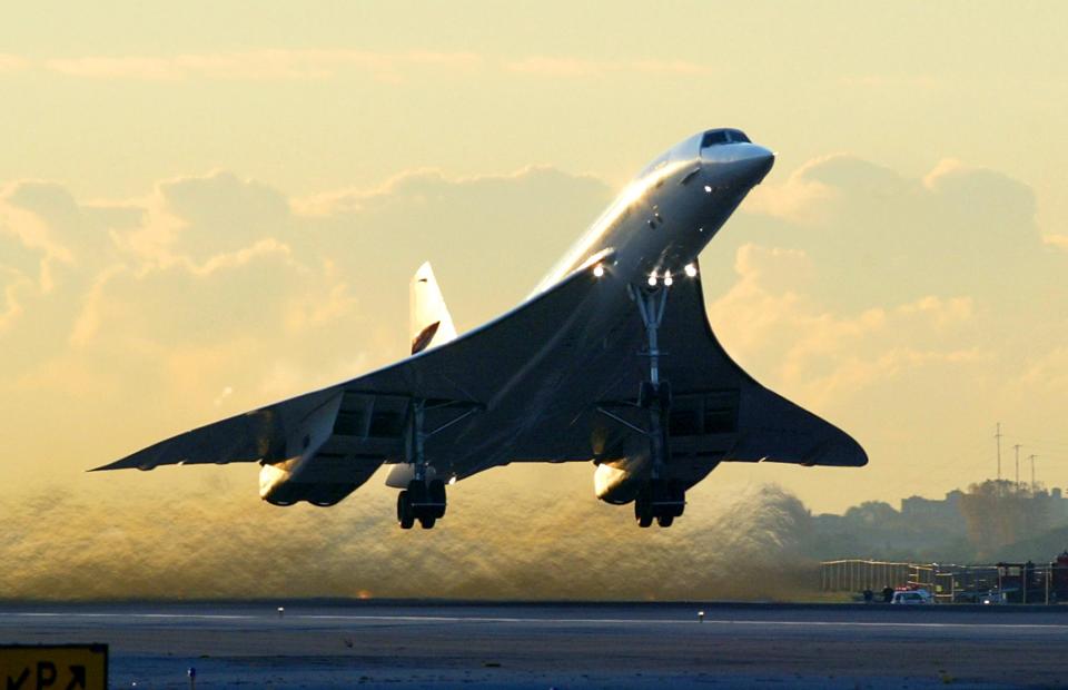 The final British Airways Concorde flight lifts off from John F. Kennedy Airport  in New York on its final voyage to London, 24 October 2003. The flight was Concorde's last ever passenger flight, sending the world's only supersonic airliner flying into the history books after 27 years of shuttling the rich and rushed across the Atlantic at twice the speed of sound.   AFP PHOTO/Timothy A. CLARY / AFP / TIMOTHY A. CLARY AND -        (Photo credit should read TIMOTHY A. CLARY/AFP via Getty Images)