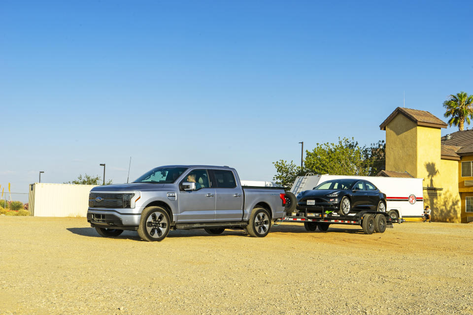 This photo, provided by Edmunds, shows the 2022 Ford F-150 Lightning. It is an all-electric pickup truck with an EPA-estimated range between 230 and 320 miles depending on the configuration. (Rex Tokeshi-Torres/Courtesy of Edmunds via AP)