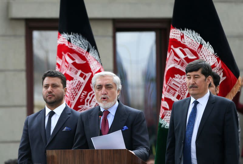 Afghanistan's Abdullah Abdullah speaks to his supporters after his swearing-in ceremony as president, in Kabul