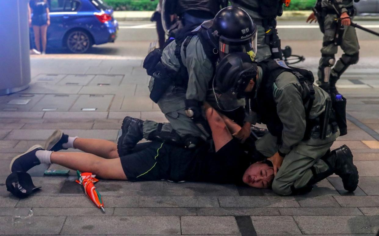 Hong Kong police carried out several arrests of protesters on Sunday - REX
