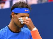 Sept 4, 2016; New York, NY, USA; Rafael Nadal of Spain reacts after a miss to Lucas Pouille of France (not pictured) on day seven of the 2016 U.S. Open tennis tournament at USTA Billie Jean King National Tennis Center. Mandatory Credit: Robert Deutsch-USA TODAY Sports