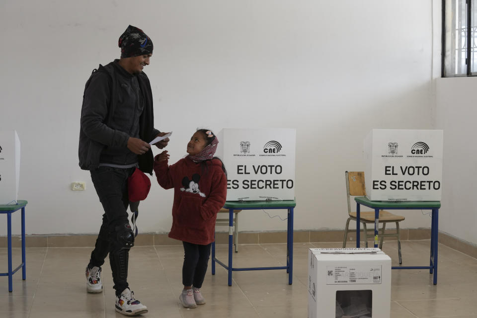 A voter prepares to cast his ballot during a runoff presidential election in Cangahua, Ecuador, Sunday, Oct. 15, 2023. (AP Photo/Dolores Ochoa)