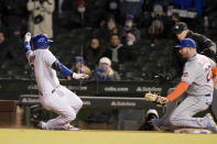 Chicago Cubs Ian Happ (8) is tagged out by New York Mets first baseman Pete Alonso (20) after scrambling back to first during the fourth inning of a baseball game Wednesday, April 21, 2021, in Chicago. (AP Photo/Mark Black)