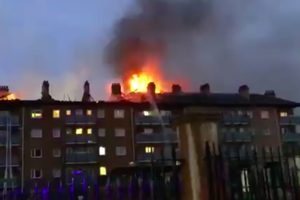 Dramatic footage showed flames tearing through the roof of the block in Bethnal Green, east London: Ali Ahmed Bebul/ Twitter