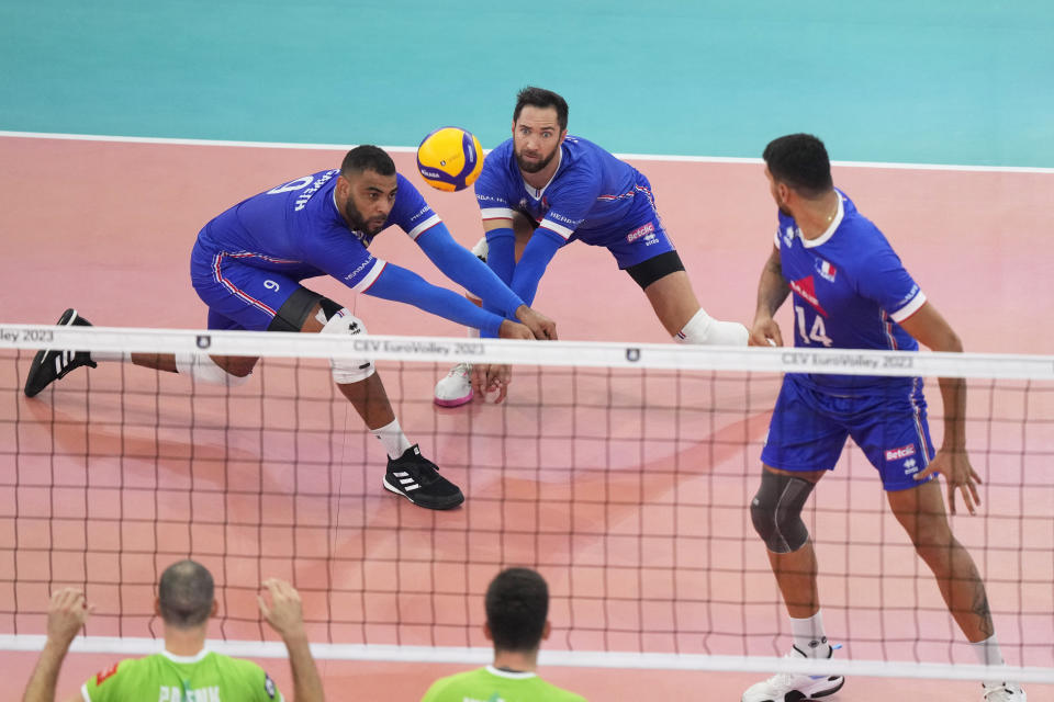 FILE - France's Earvin N'Gapeth, left, in action during the Men's European Volleyball bronze medal final between France and Slovenia, in Rome, Saturday, Sept. 16, 2023. (AP Photo/Andrew Medichini, File)