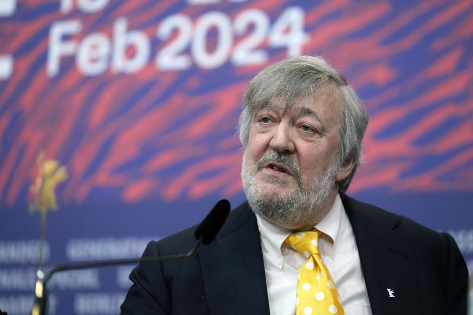 British actor and comedian Stephen Fry speaks during a press conference for the film "Treasure" during the International Film Festival, Berlinale, in Berlin, Saturday, Feb. 17, 2024. The 74th edition of the festival will run until Sunday, Feb. 25, in the German capital. (AP Photo/Ebrahim Noroozi)