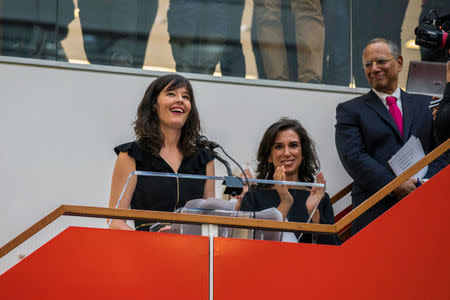 New York Times staff writers Jodi Kantor and Megan Twohey (L) address colleagues after the team they led won the 2018 Pulitzer Prize for Public Service in the newsroom in New York, NY, U.S. April 16, 2018. Courtesy Hiroko Masuike/The New York Times/Handout via REUTERS ATTENTION EDITORS - THIS IMAGE WAS PROVIDED BY A THIRD PARTY. NO RESALES. NO ARCHIVE.