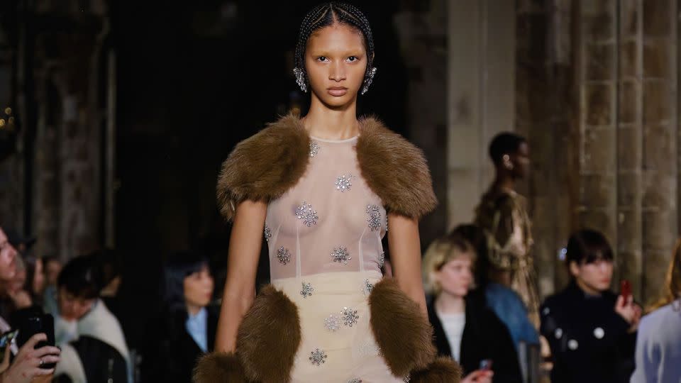 Faux fur was a major theme at the Simone Rocha show, where patches were used to alter the silhouette like hip or shoulder pads. - Ben Broomfield