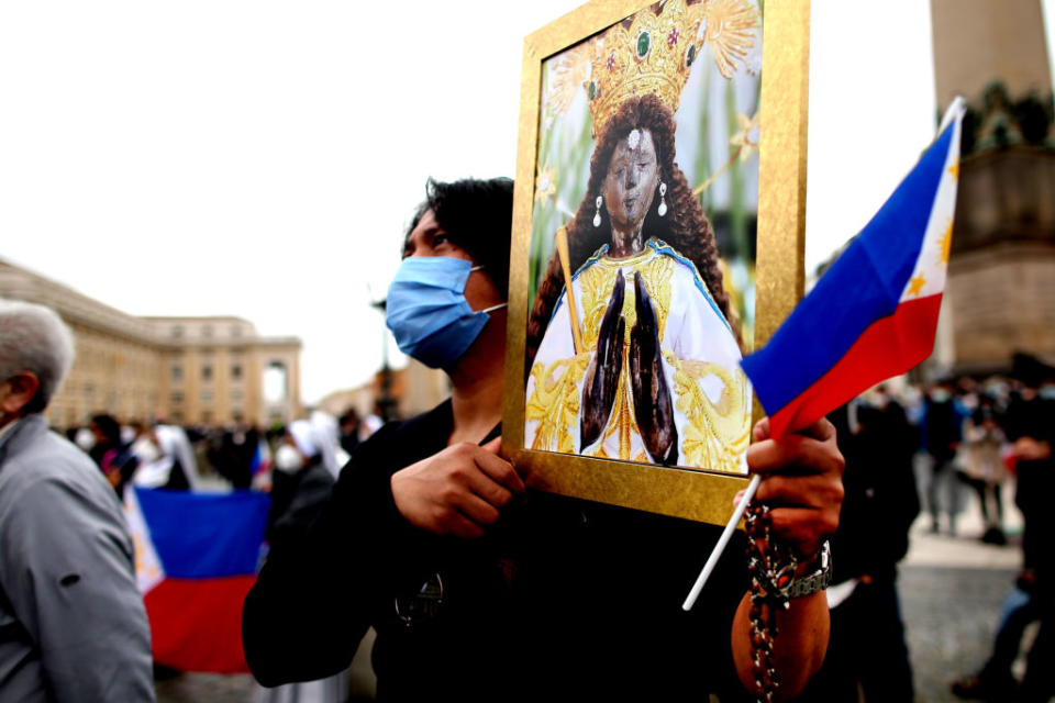 A Catholic from the Philippines attends a mass in Vatican City, Vatican, on March 14, 2021.<span class="copyright">Franco Origlia/Getty Images</span>