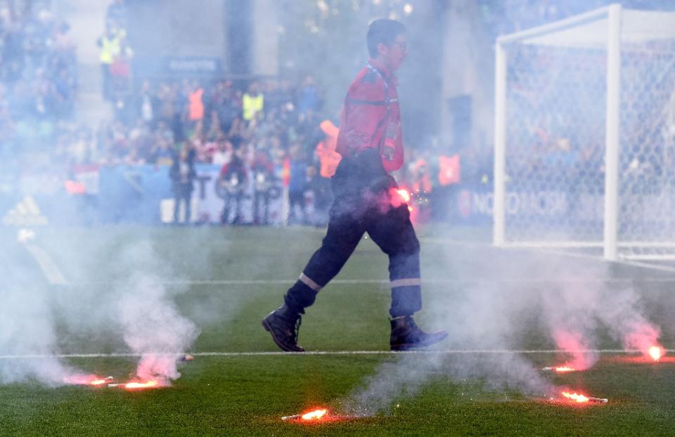 Flares thrown on the field by Croatian fans (AFP).