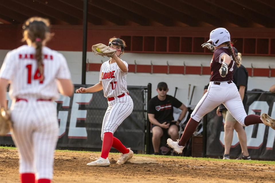 Vista Ridge first baseman Mikala Ham completes the putout of Round Rock's Jalyn Templeton during the Rangers' 11-0 win last week. The win gave the Rangers a second-place finish in District 25-6A behind district champion Cedar Ridge. The state playoffs begin later this week.