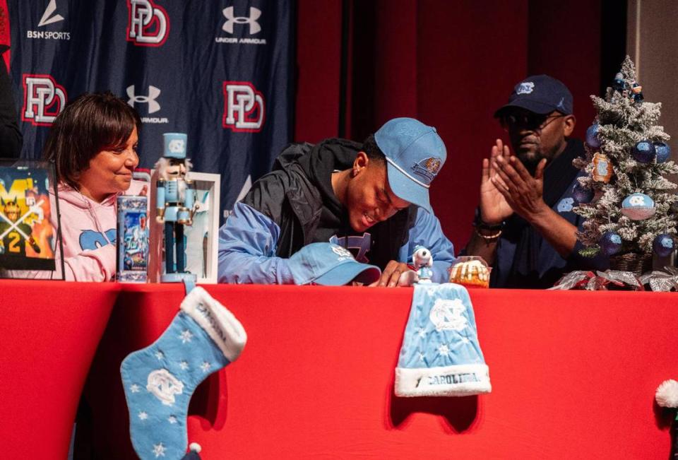 Jordan Shipp signs to UNC Chapel Hill during a ceremony for Providence Day’s early college signees Charlotte, N.C., on Friday, December 8, 2023. Khadejeh Nikouyeh/Knikouyeh@charlotteobserver.com
