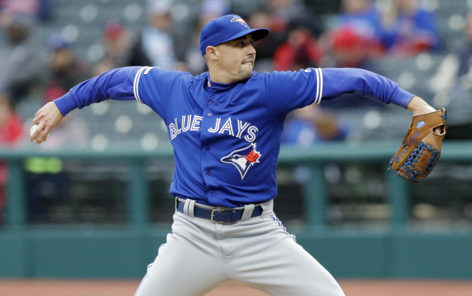 Toronto Blue Jays starting pitcher Aaron Sanchez delivers in the first inning of a baseball game against the Cleveland Indians, Thursday, April 4, 2019, in Cleveland. (AP Photo/Tony Dejak)