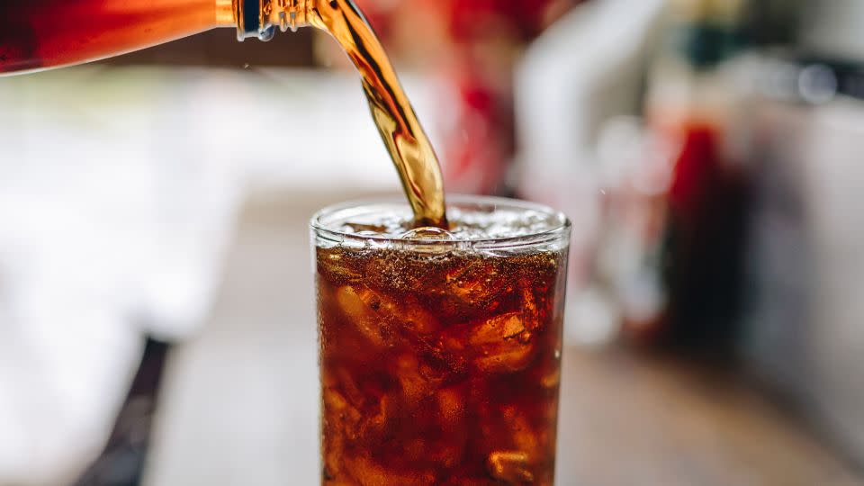 Replacing both diet and added sugar sodas with water is best to reduce chances of atrial fibrillation, experts say. - 24foto/iStockphoto/Getty Images