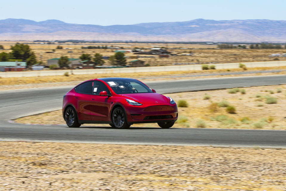 This photo provided by Edmunds, shows the 2023 Tesla Model Y Performance, a compact SUV with acceleration that can rival a number of dedicated sports cars. (Rex Tokeshi-Torres/Edmunds via AP)