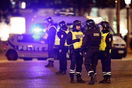 Police secure the Champs Elysees Avenue after one policeman was killed and another wounded in a shooting incident in Paris, France, April 20, 2017. REUTERS/Christian Hartmann